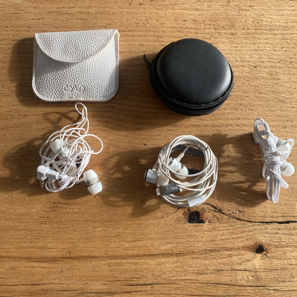 Three Earbuds and 2 Cases iphone Black White Preloved